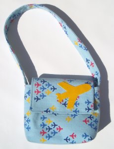 airplane print corduroy purse